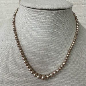 Vintage graduated cream colored pearl bead necklace
